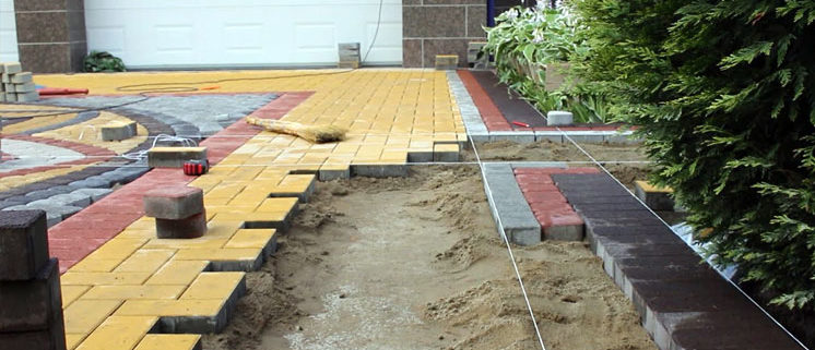 Укладка тротуарной плитки на землю